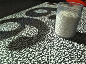 Patterns on a table and a glass of milk, Route 66